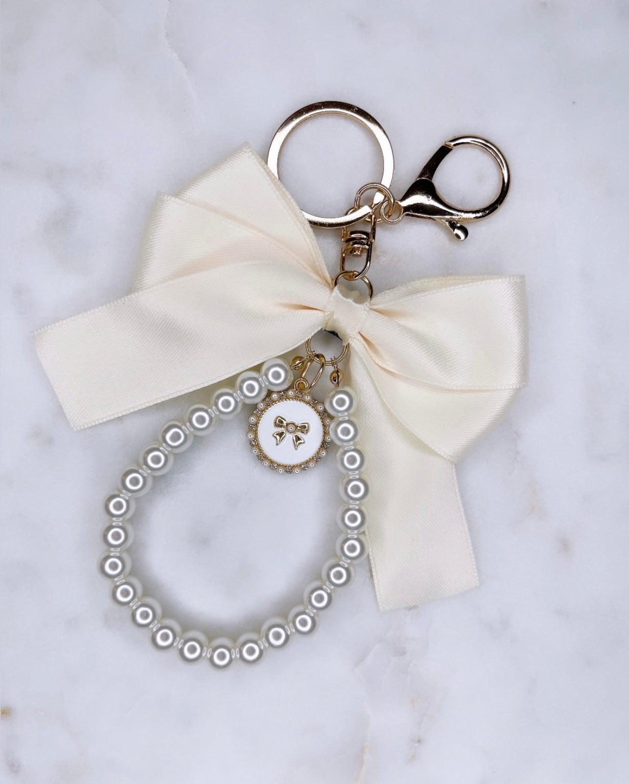 Bow Vibes - Pearl Wristlet